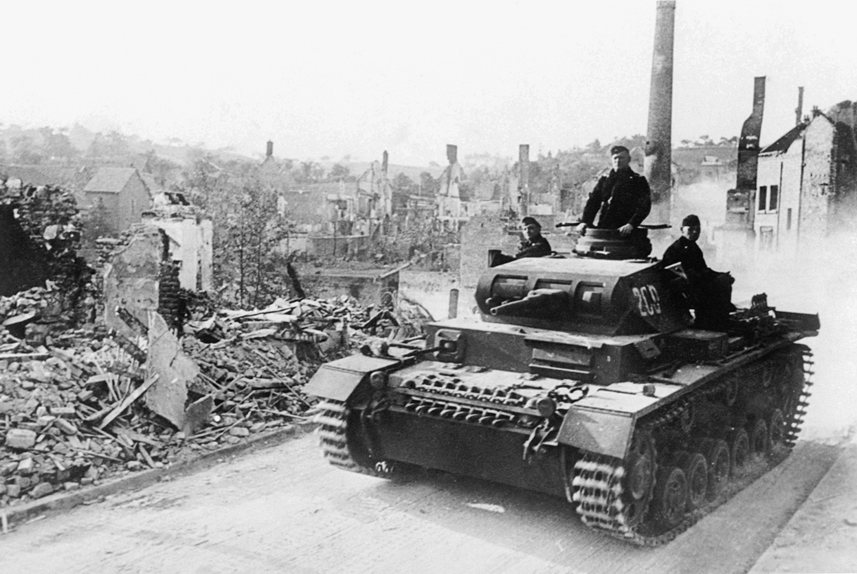 A German armored tank crosses the Aisne River in France, on June 21, 1940, one day before the surrender of France. (AP Photo)